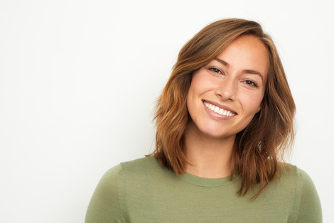 closeup of young woman smiling 